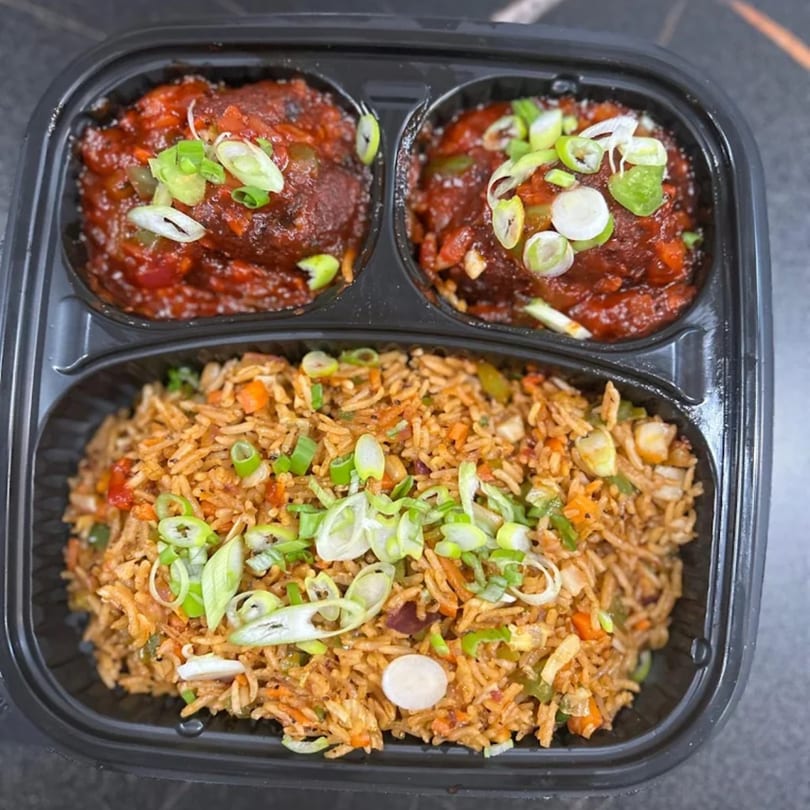 Indian takeout meal with two portions of chili chicken and a large portion of fried rice.